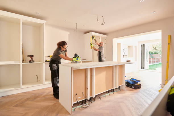 kitchen fitters installing some cabinets kitchen fitters installing some cabinets